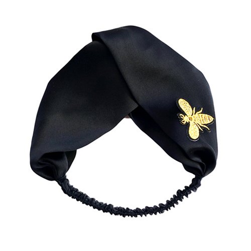 Custom embroidered silk headband with a logo detail