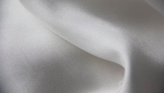Diagonal rib and structured hand of silk twill fabric