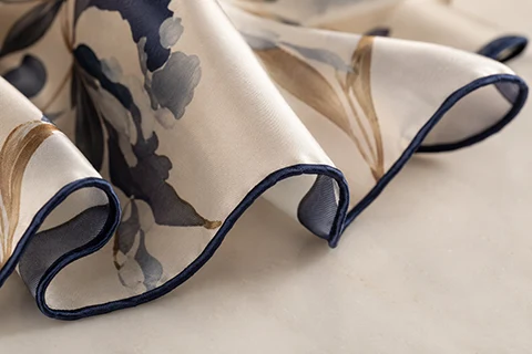 hand-rolled-hem-silk-scarf Hand-rolled hem detail on a museum silk scarf