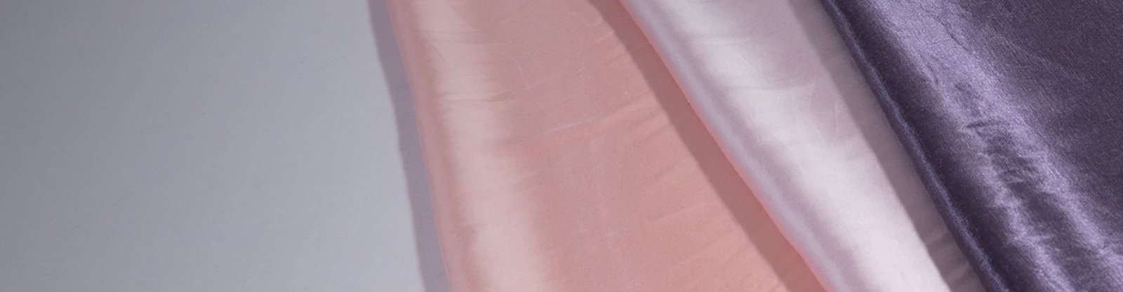 modal silk fabric overview Modal silk fabric rolls and surface detail for a custom fabric program