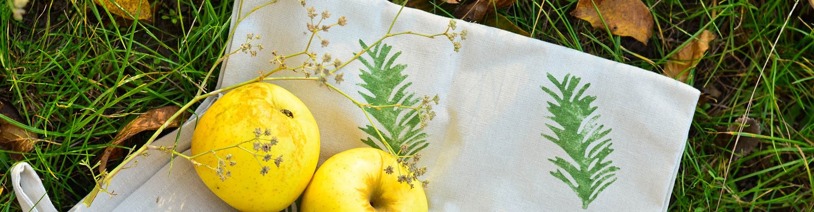Printed tea towel with custom artwork for a private-label kitchen textile program