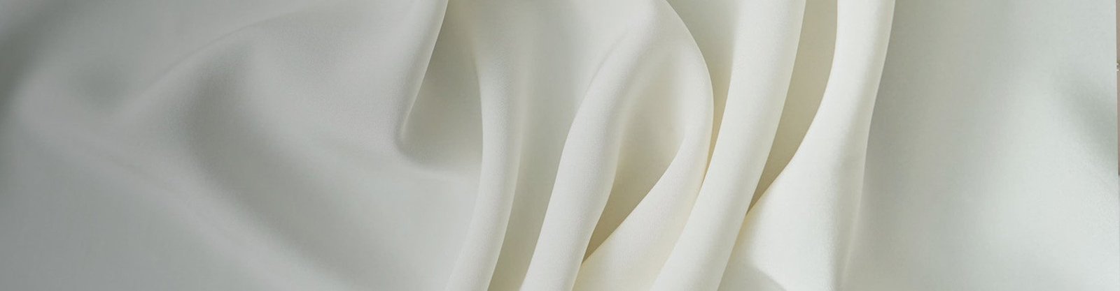 Silk crepe de chine fabric rolls and surface detail for a custom fabric program