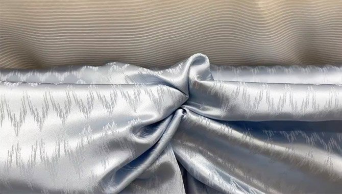 silk jacquard benefits Silk jacquard fabric texture and woven pattern detail