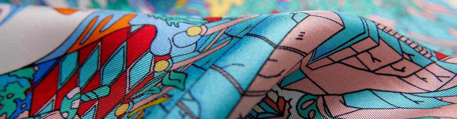 Silk twill fabric rolls and diagonal surface detail for a custom fabric program