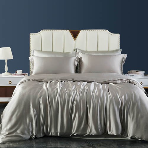 Solid-colour silk bedding set for a coordinated bedroom collection