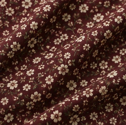 Ditsy floral fabric pattern swatch with small repeated flowers