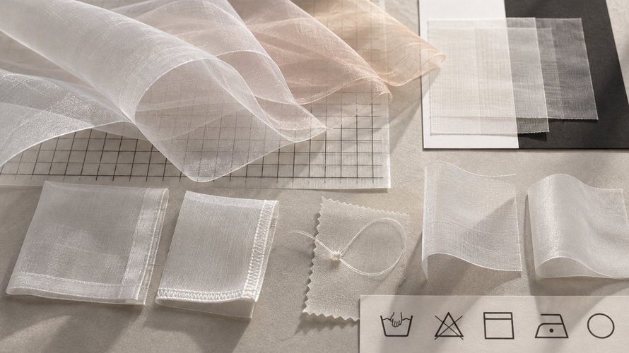 Organza buyer checks with light box, edge sample, snag test, stiffness card and care notes